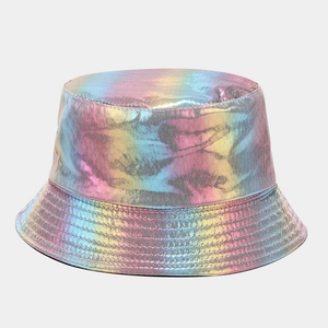 Detail shot of the rainbow laser PU leather texture on a metallic gradient bucket hat