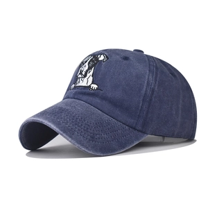 Washed dark blue vintage baseball cap featuring a detailed bulldog face embroidery