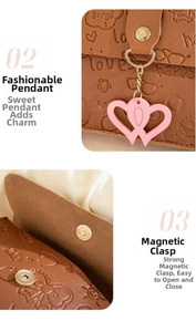 Detail of brown litchi leather wallet with heart charms and secure magnetic closure