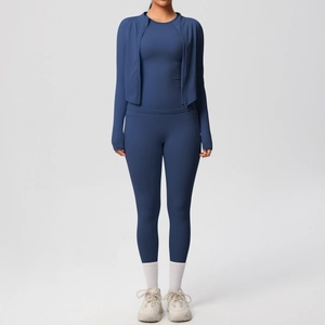 Three-piece yoga set with navy blue long-sleeve jacket, tank top, and high waist leggings