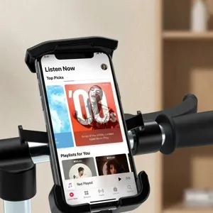 Close-up of a secure black mechanical phone mount installed on bicycle handlebars