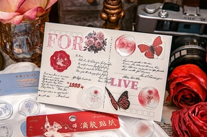 Detail of vintage embossed rose and butterfly stickers with 3D crystal resin effect