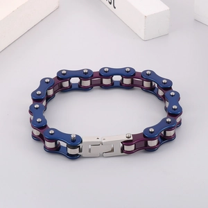 Detail view of industrial bike chain bracelet in blue, purple, and silver stainless steel