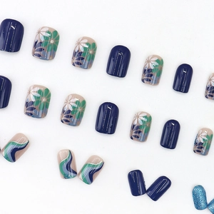 Morandi blue floral press-on nails with sparkling glitter and wave patterns on white background