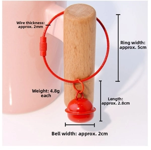 Detail showing red painted bell dimensions with steel wire loop on pink handle