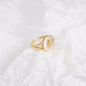 Elegant gold tulip ring with white shell petal detail and adjustable open band for women