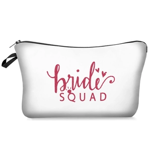 White bridal squad makeup bag with red glitter lettering and black zipper closure