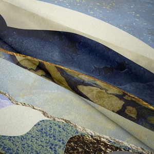 Detailed close-up showing the fine fabric texture and abstract mountain art on the tapestry