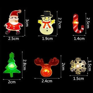 Set of 6 mini LED Christmas pins with Santa, snowman and snowflake shapes and dimensions