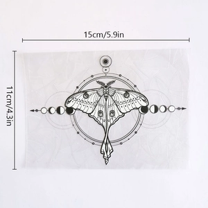 Macro view of window prism decal with moth and moon phase patterns measuring 15x11cm