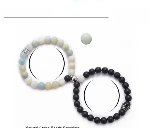 Detail showing 8mm crown bracelets with magnetic clasp for couples on white background