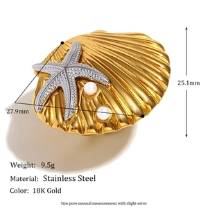 Macro detail of 18K gold-plated stainless steel starfish and pearl earrings with measurements