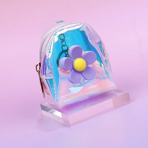 Detail of laser transparent mini backpack wallet featuring a 3D purple flower and key ring