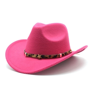 Detail of rose pink wool cowboy hat with leopard print band and star metal buckle