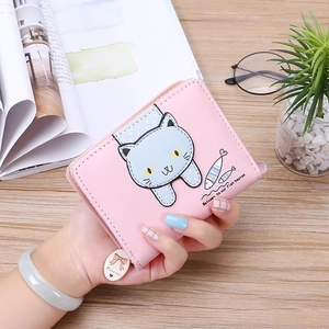 Pink bifold short wallet featuring cute cartoon cat print and bow zipper charm details