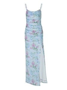 Detailed view of light blue floral print maxi dress with ruched texture and high side slit