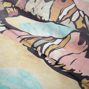 Macro shot showing soft texture and artistic mountain patterns on the tapestry fabric