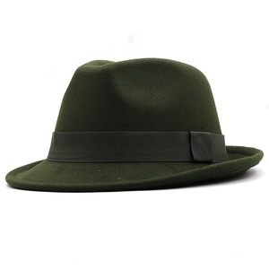 Detailed close-up of dark green wool felt fedora hat featuring a matching satin ribbon trim