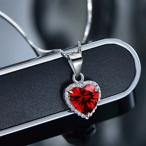 Elegant S925 sterling silver necklace with heart-shaped red zircon and pavé setting