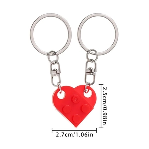 Detailed view of two red interlocking bricks forming a heart with size dimensions