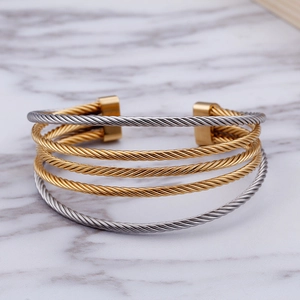 Minimalist multi-layered C-shaped metal cable cuff bracelet in gold and silver finish