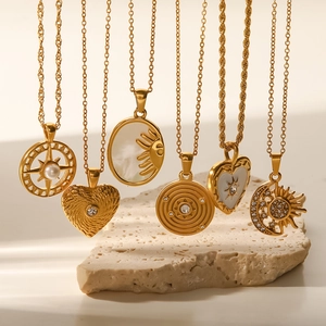 Gold plated stainless steel necklaces with celestial sun and moon shell pendants