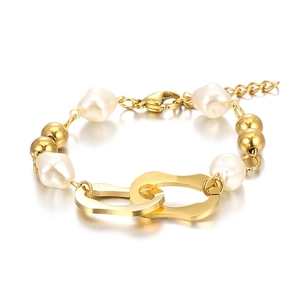 Elegant gold stainless steel bracelet featuring baroque pearls and interlocking rings