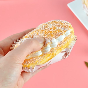 Squeezable PU faux cream bread model with realistic texture for kitchen decor