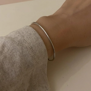 Minimalist S925 sterling silver geometric open thin bangle bracelet worn on wrist