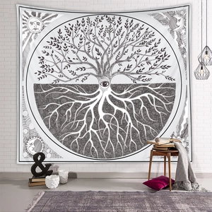 Close-up of black and white tree of life tapestry with sun and moon tarot patterns