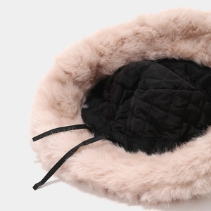 Faux mink fur bucket hat for women with warm quilted lining and adjustable ribbon tie