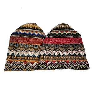 Ethnic knit beanie hats with colorful bohemian geometric patterns for winter warmth