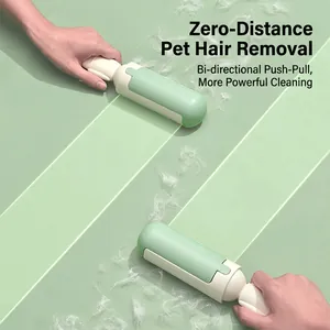 Capsule shaped dual-way lint and pet hair remover roller for carpets in mint green