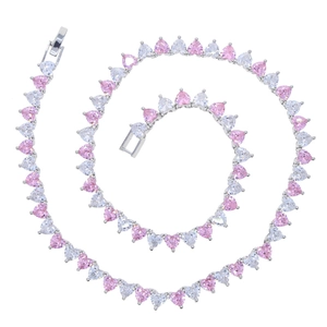 Detail shot of heart-shaped pink and white zircon tennis chain with secure box clasp