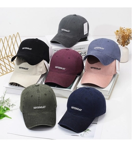 Assortment of vintage washed cotton baseball caps with COYENRAT embroidery in eight colors