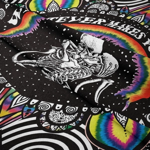 Detail showing high-quality print texture of bohemian tapestry with skull art design
