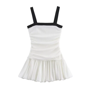 Women's chic contrast color white mini dress with black wide straps and pleated hemline