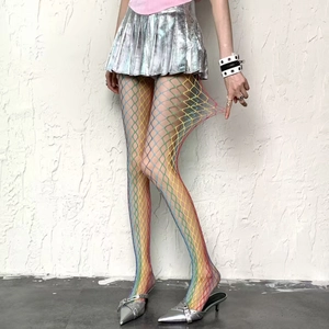 Detailed view of rainbow gradient fishnet tights with high elasticity for women