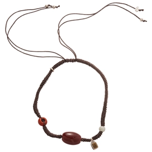 Ethnic handmade braided rope necklace with red agate beads and vintage silver charms