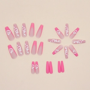 Long ballerina press-on nails with pink glitter and white heart pattern designs