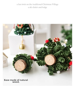 Detail of DIY mini spiral Christmas tree with wool balls and natural wood base