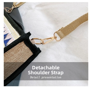 Detail presentation of removable woven shoulder strap with gold metal hooks on crossbody bag