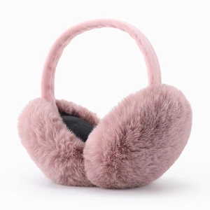 Close-up detail of soft pink plush winter earmuffs with high-quality faux fur texture