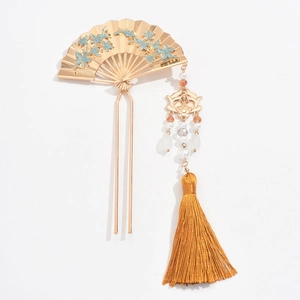 Detailed view of golden folding fan hair pin with blue flowers and long pearl tassels
