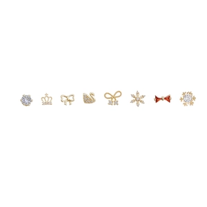 Elegant 8-piece stud earring set with zircon swan and bow designs in gold and silver