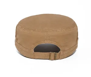 Detail of khaki washed canvas flat top cap showing adjustable strap and bronze buckle
