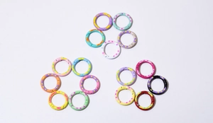 Polka dot spring ring clasps in purple, pink, and blue for DIY keychain accessories