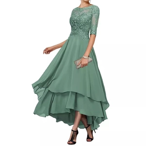Elegant sage green evening gown with lace embroidery and tiered skirt layers