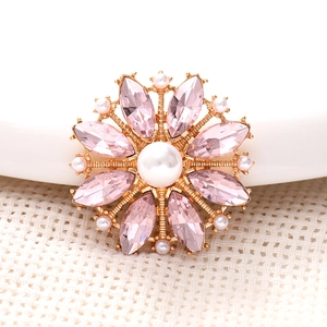Pink marquise crystal flower brooch with white pearls on a gold-tone base accessory