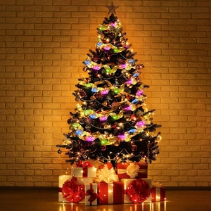 Close-up of golden LED ribbon string lights decorating a Christmas tree with gift boxes